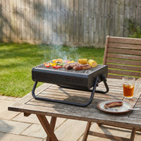 29cm Portable Charcoal BBQ Grill with Foldable Legs and Vents for Camping and Garden Cooking